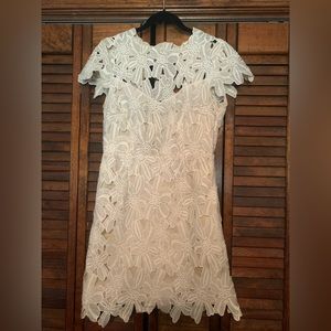White lace dress. Perfect for bridal shower/rehearsal dinner